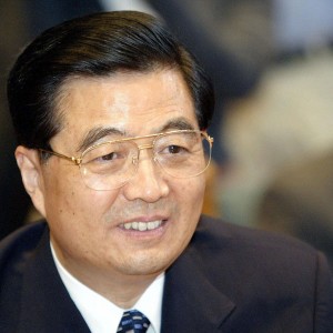 A portrait of President Hu Jintao (L) of